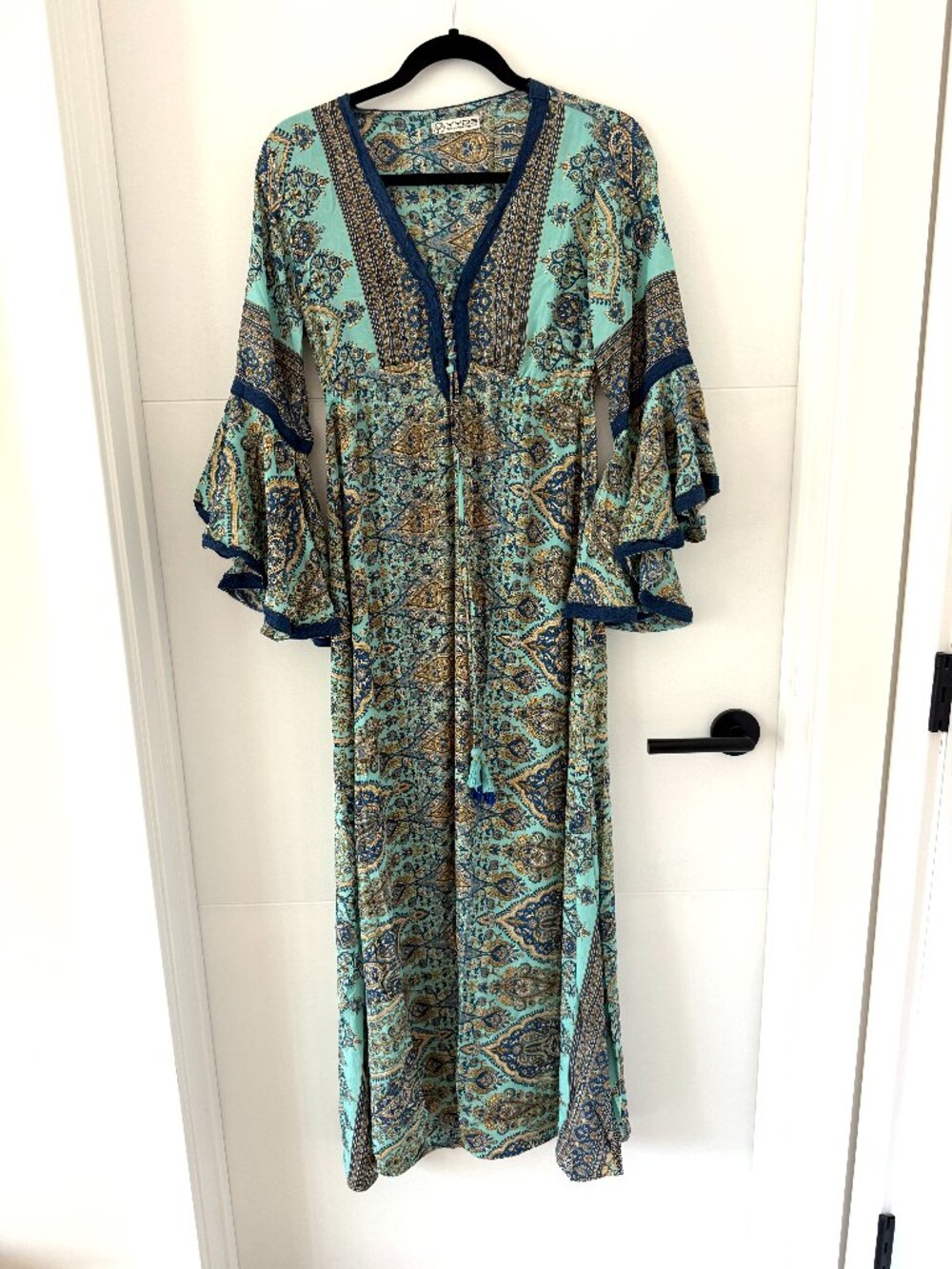 Indian inspired dress size medium with blue designs and bell sleeves